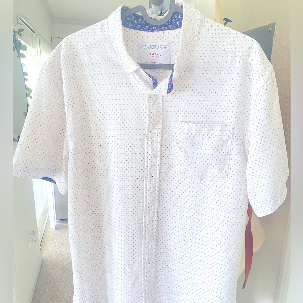 Internacional Report 4 Way stretch button down shirt. Breathable fabric.